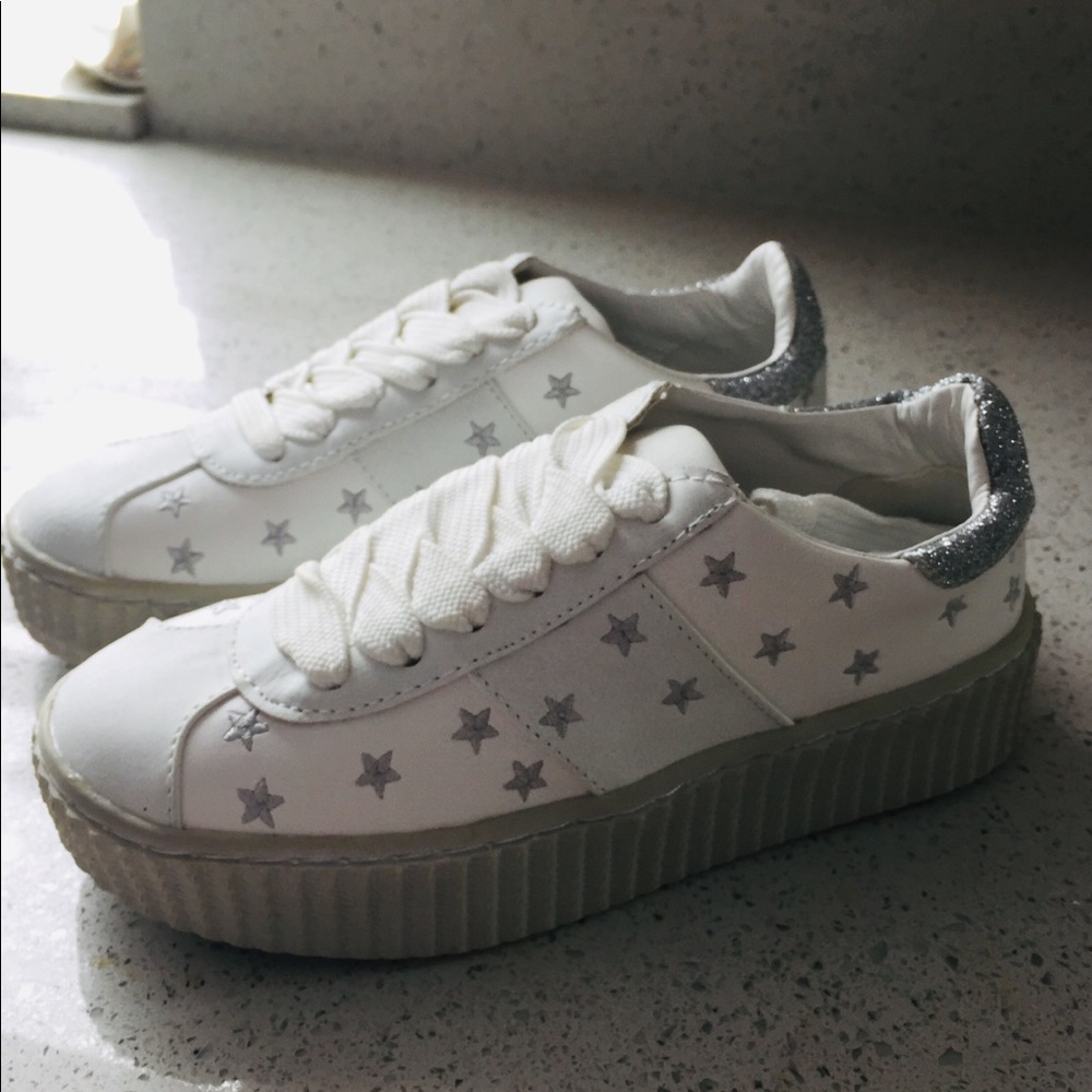 White sneakers with embroidered silver stars